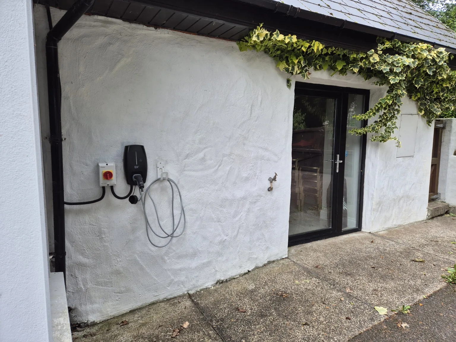 Proxima home EV charger installation on an exterior wall in County Kerry